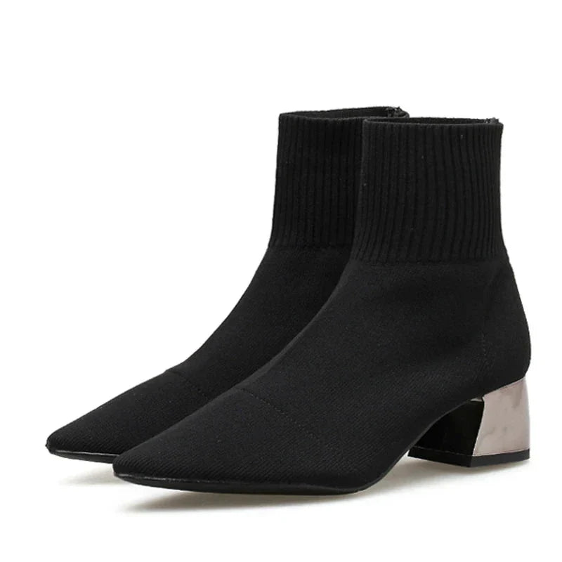 Women's black knitted ankle boot slip-on bootie with stretchy sock-like upper and round toe