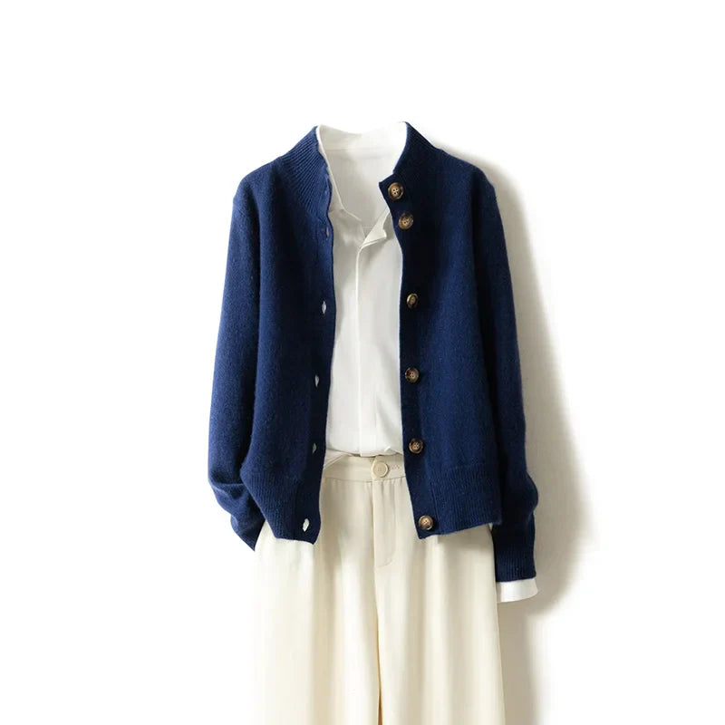 Aveline Park ivory cashmere cardigan with high neck, ribbed cuffs, and prominent brown buttons