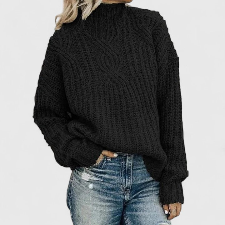 Sophisticated women's sweater in neutral tones with tailored drape and polished slim-fit silhouette