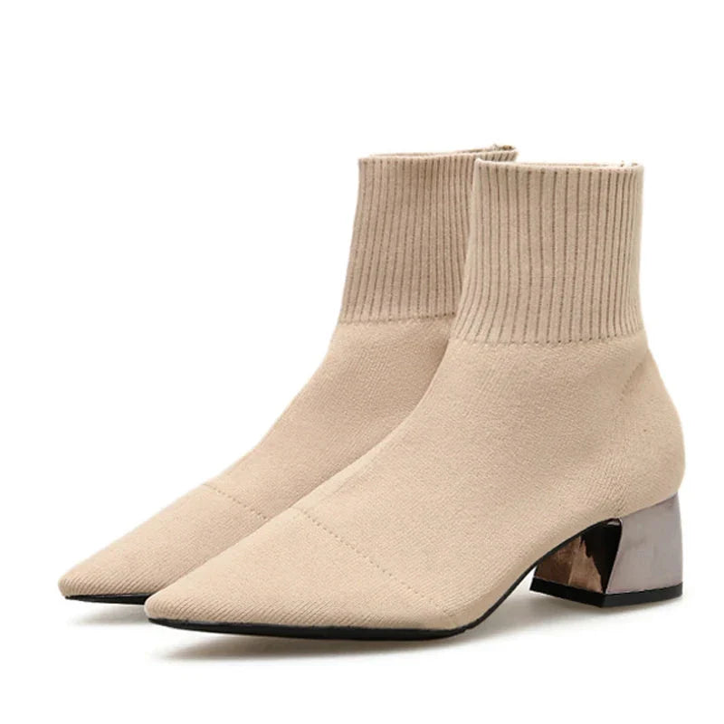 Women's slip-on knitted ankle boot with sock-like elastic upper and round toe silhouette