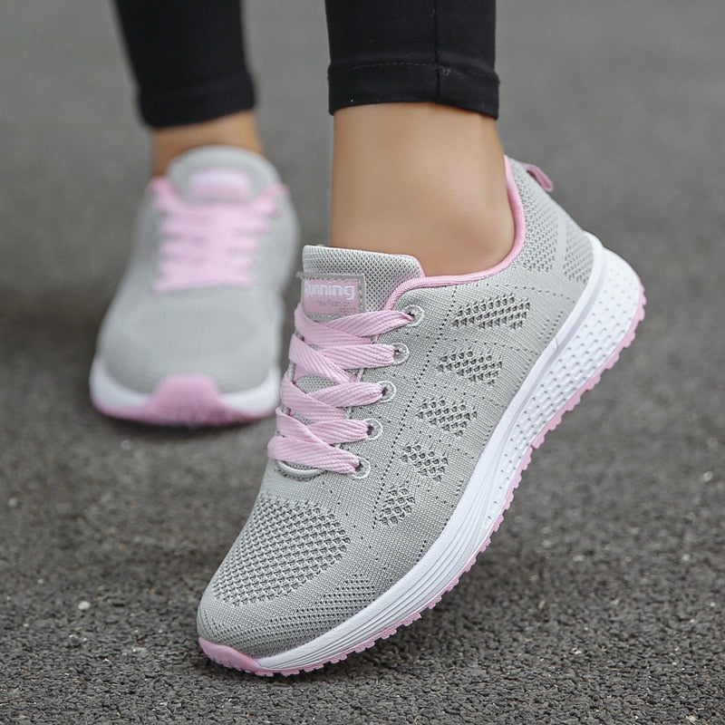 Women's gray comfort lace-up walking shoes with cushioned sole and lightweight nylon upper