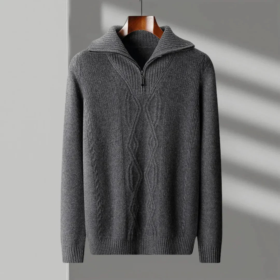 Ivory merino wool half-zip sweater with cable-knit pattern and ribbed collar