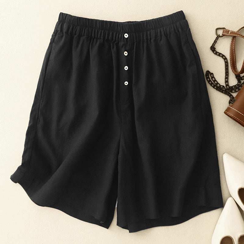 Haven relaxed linen shorts in neutral tone, elastic waistband, button-front detail, lightweight summer fit