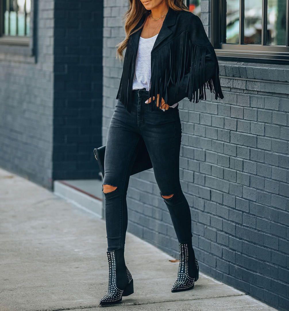 Women's tan suede moto jacket with bold fringe detailing, fitted silhouette for day-to-night style