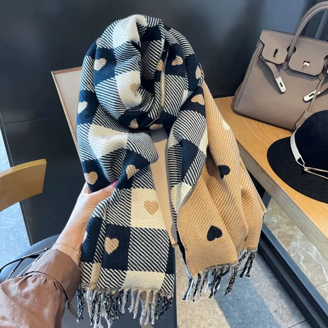 Women's plaid scarf with heart accents and fringed edges in soft warm fabric for winter styling