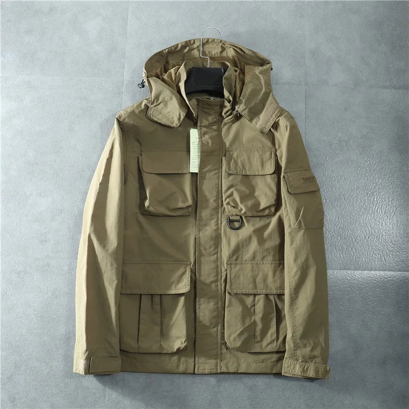 Hawk Down tactical jacket in neutral tones, slim-fit utility style with removable hood and multi-pocket design