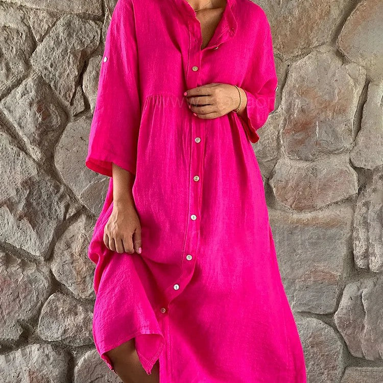 Women's flowy midi dress in elegant evening style with defined waist and flowing silhouette