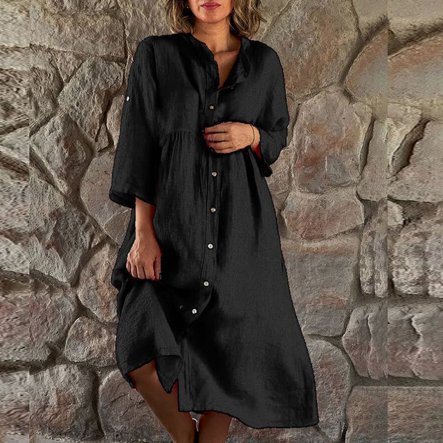 Women's flowy midi dress in elegant silhouette with defined waist and flowing skirt for evening wear