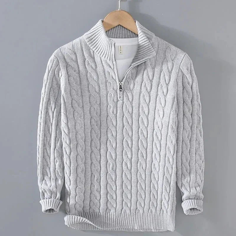 Cream cable knit cotton half-zip sweater with ribbed trims and classic textured pattern