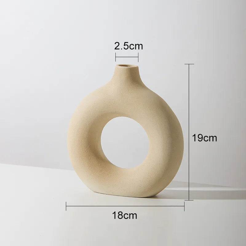 Hadran circular ceramic vase in minimalist Scandinavian style, elegant neutral tones for modern home decor