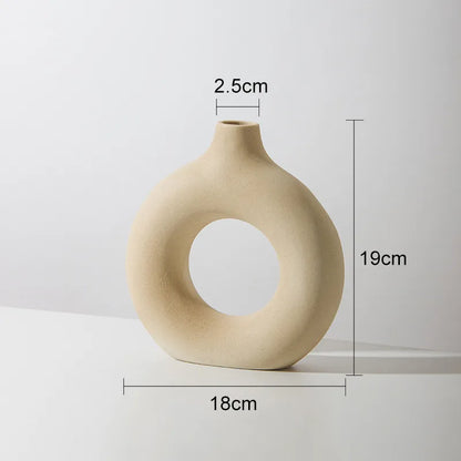 Hadran circular ceramic vase in minimalist Scandinavian style, elegant neutral tones for modern home decor