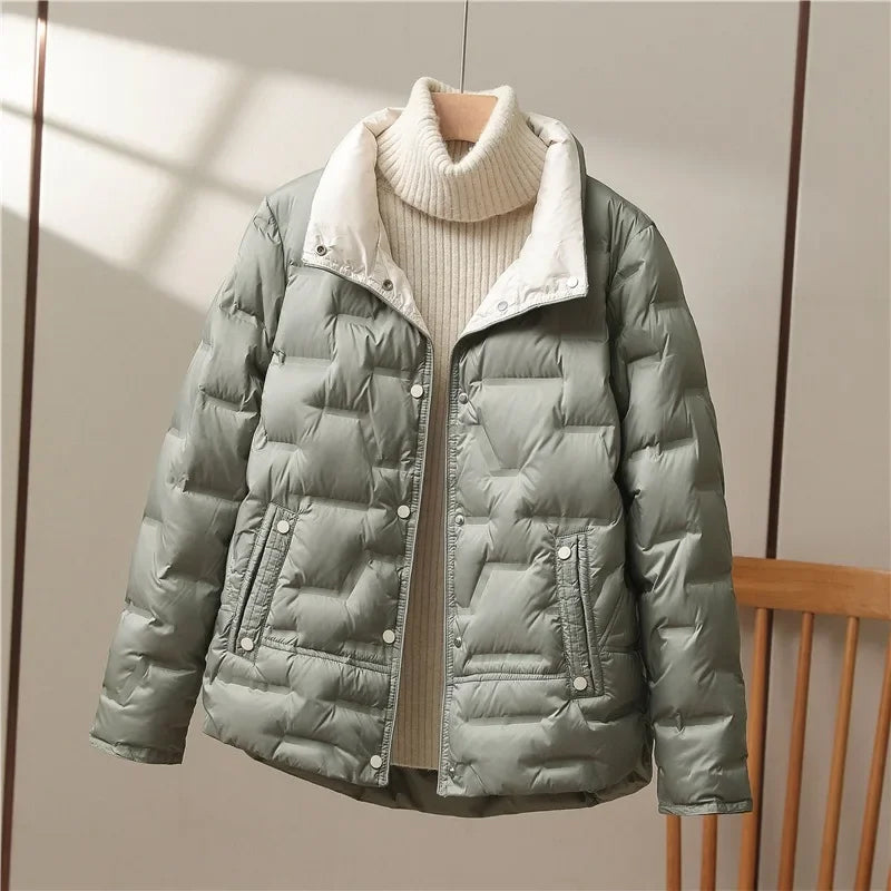Black high collar quilted down jacket unisex minimalist matte finish sleek slim silhouette