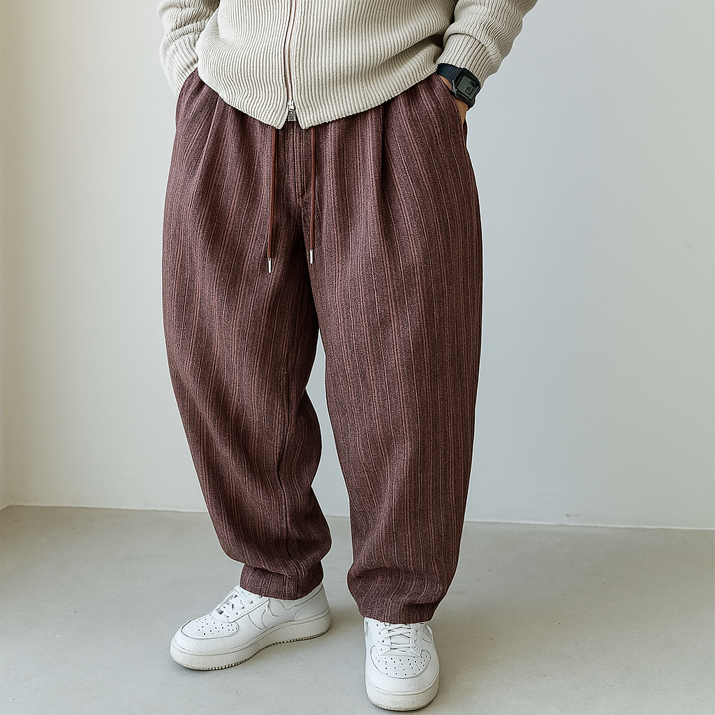 Tapered herringbone sweatpants with drawstring waistband, vintage-inspired relaxed fit casual style