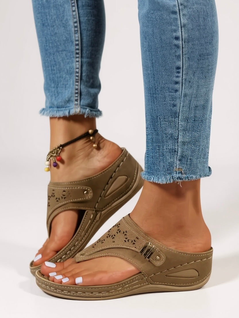 Women's beige cushioned adjustable sandals with soft footbed straps for everyday comfort