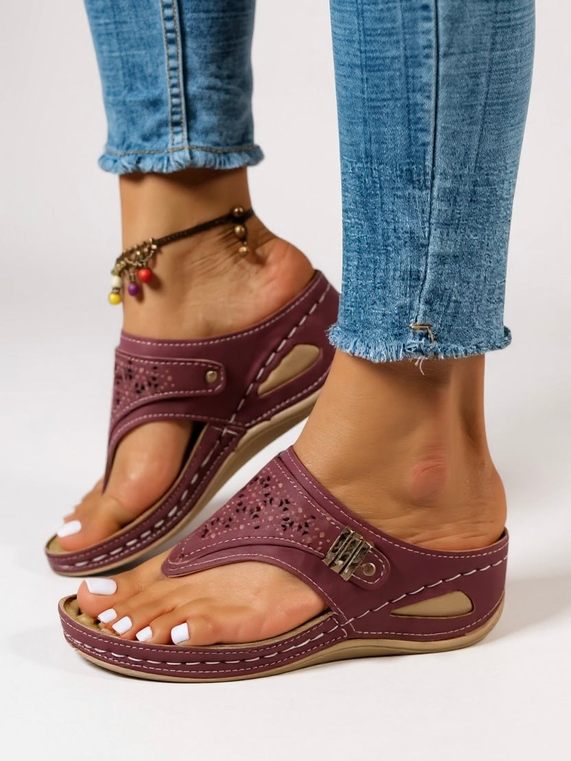 Women's cushioned adjustable sandals in neutral tones with supportive footbed and flexible straps