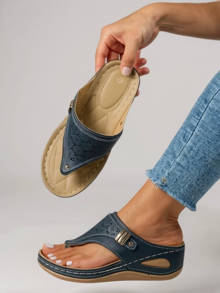 Women's cushioned adjustable sandals in neutral tones with padded footbed and lightweight silhouette