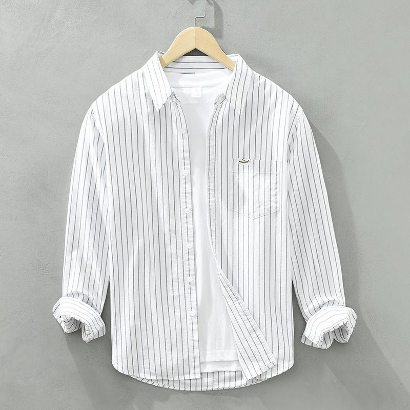 Men's white and blue vertical striped casual shirt with relaxed modern fit and button-down collar