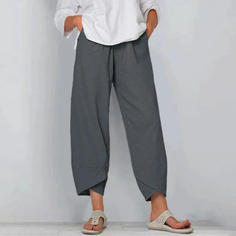 Women's chic white summer pants with breathable fabric and softly tailored wide-leg silhouette