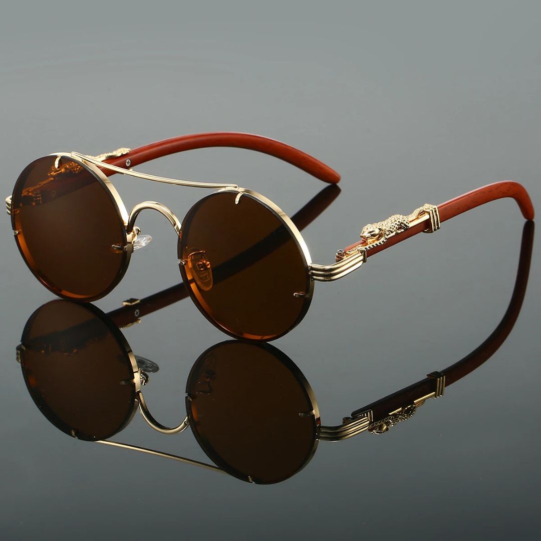 Gold vintage panther embellished sunglasses with UV400 gradient lenses and lightweight frame