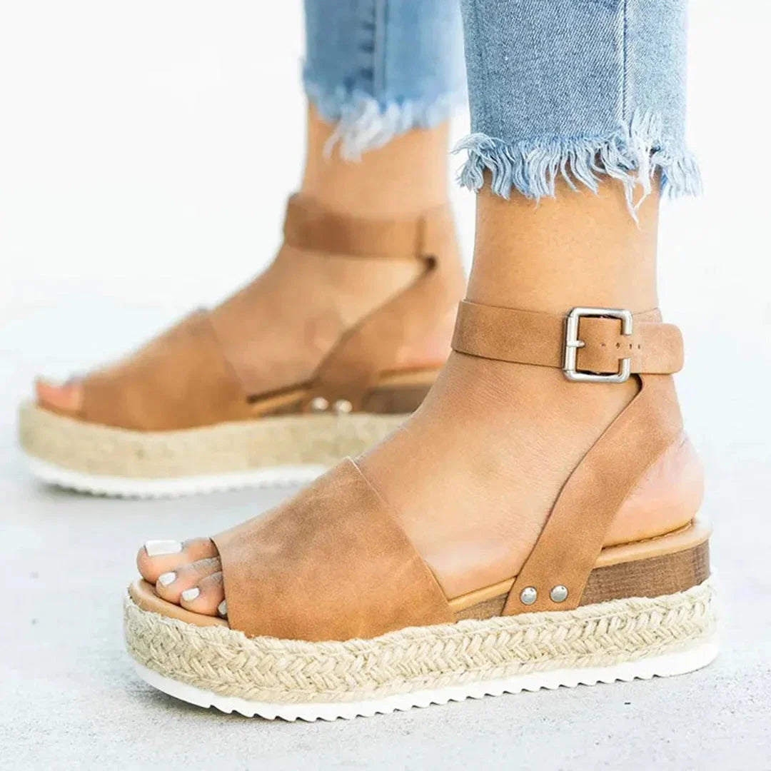 Women's beige espadrille platform sandals with adjustable ankle strap and braided jute-wrapped sole
