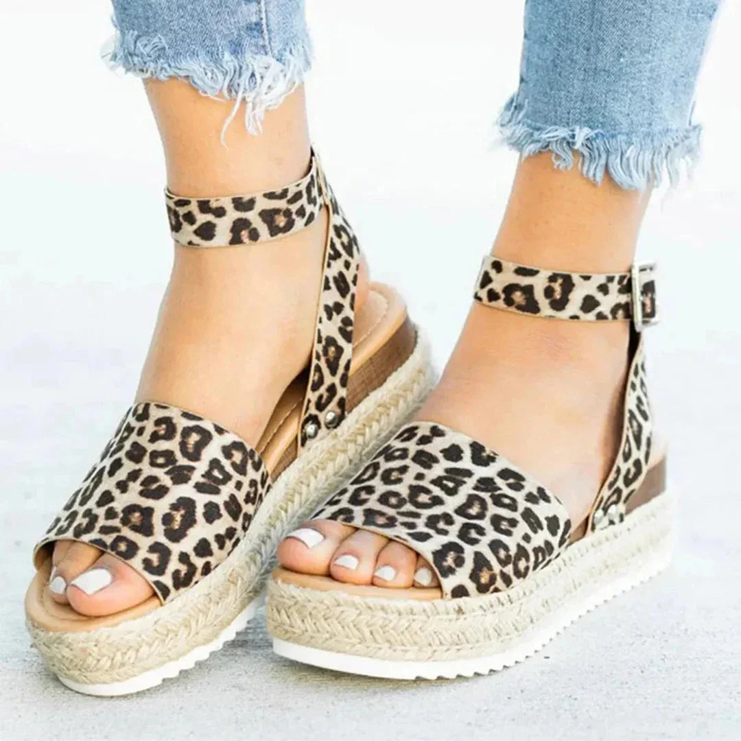 Women's beige espadrille platform sandals with adjustable ankle strap and jute-wrapped braided sole