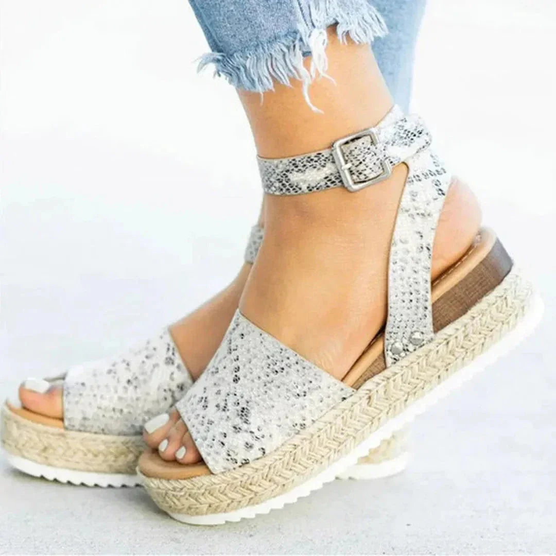 Women's beige espadrille platform sandals with braided jute sole and adjustable ankle strap