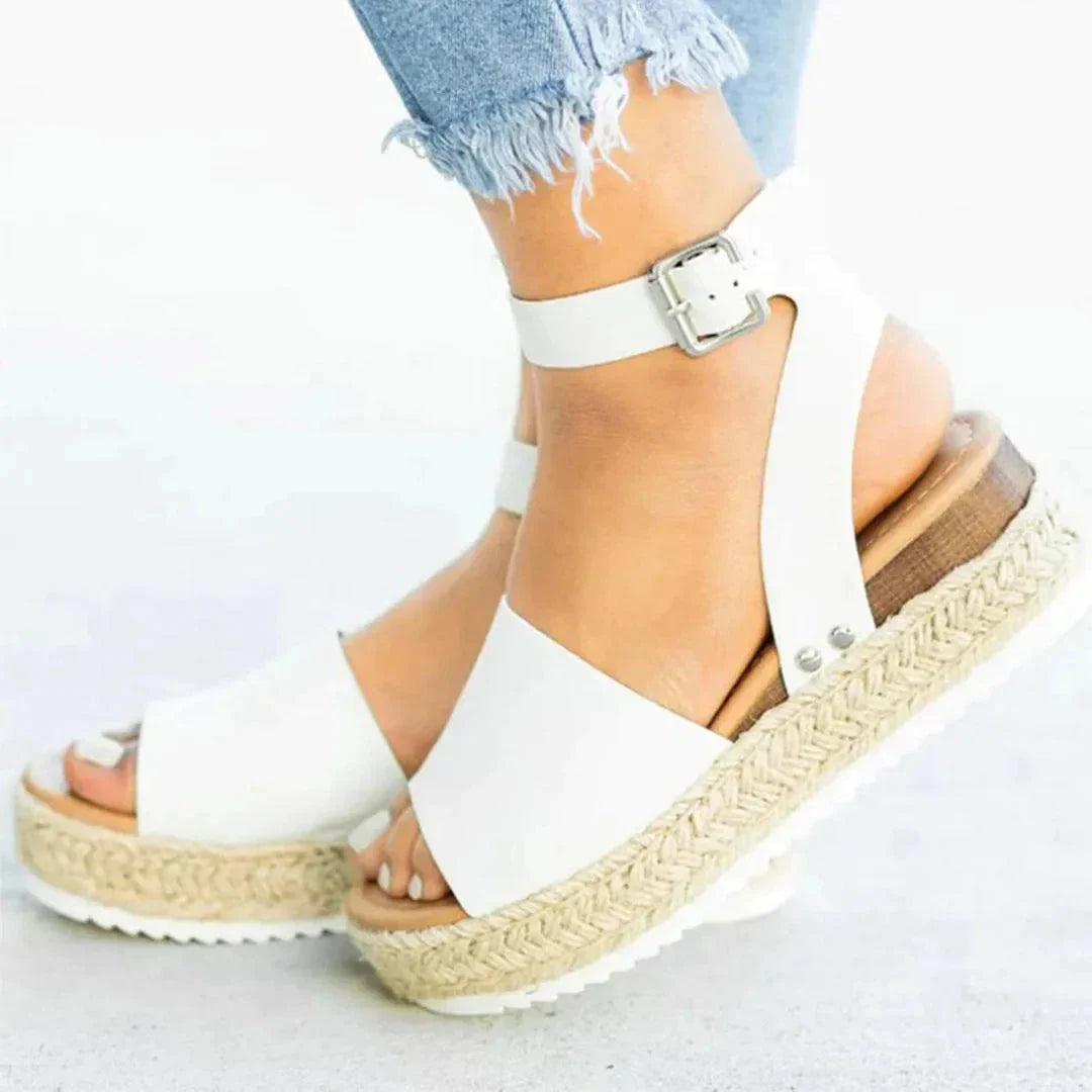Women's beige espadrille platform sandals with adjustable ankle strap and braided jute-wrapped sole