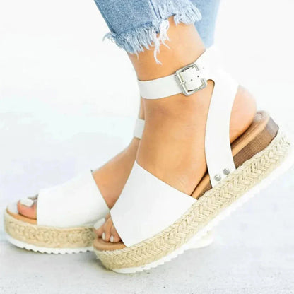 Women's beige espadrille platform sandals with adjustable ankle strap and braided jute-wrapped sole