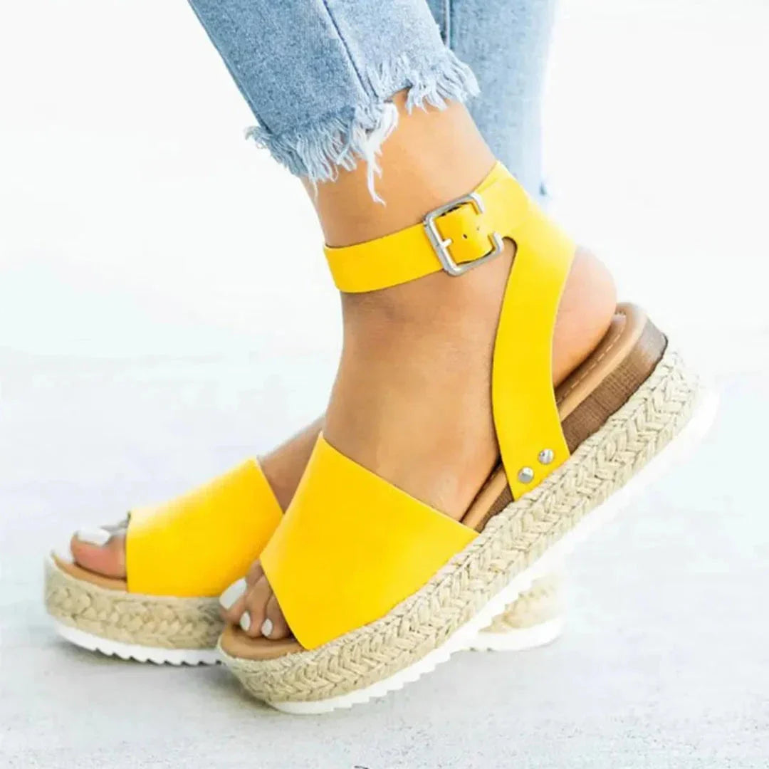 Women's beige espadrille platform sandals with jute-wrapped sole and adjustable ankle strap