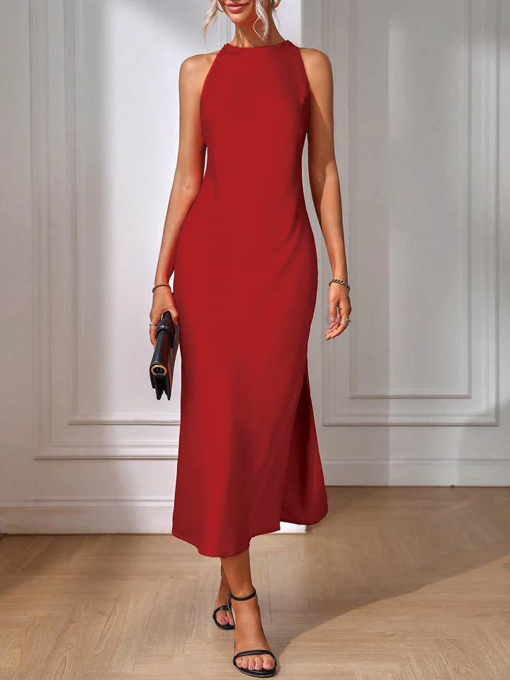 Sleeveless maxi dress in elegant silhouette with architectural back and side cutouts for formal events
