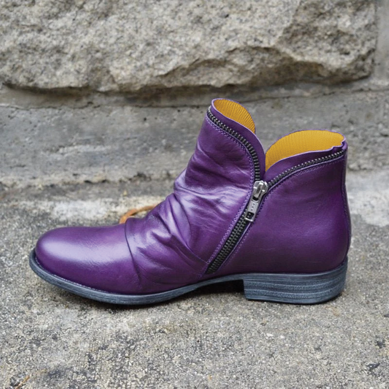 Women's black vegan leather ankle boots sleek silhouette with cozy interior lining for fall winter