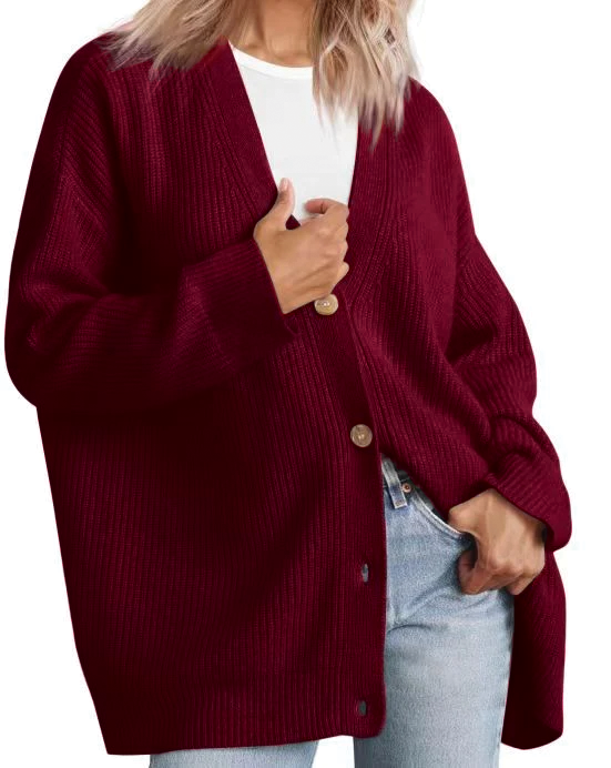 Striped knit cardigan oversized fit with V-neckline and classic button-down design in cozy soft fabric