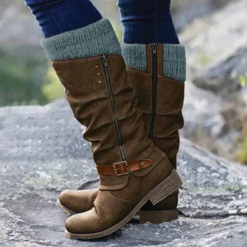 Black knee-high boots with buckle strap accent and soft knit cuff for autumn style