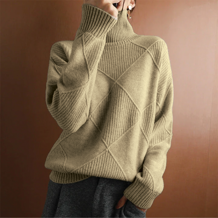 Cream diamond knit turtleneck sweater with ribbed neckline and textured pattern