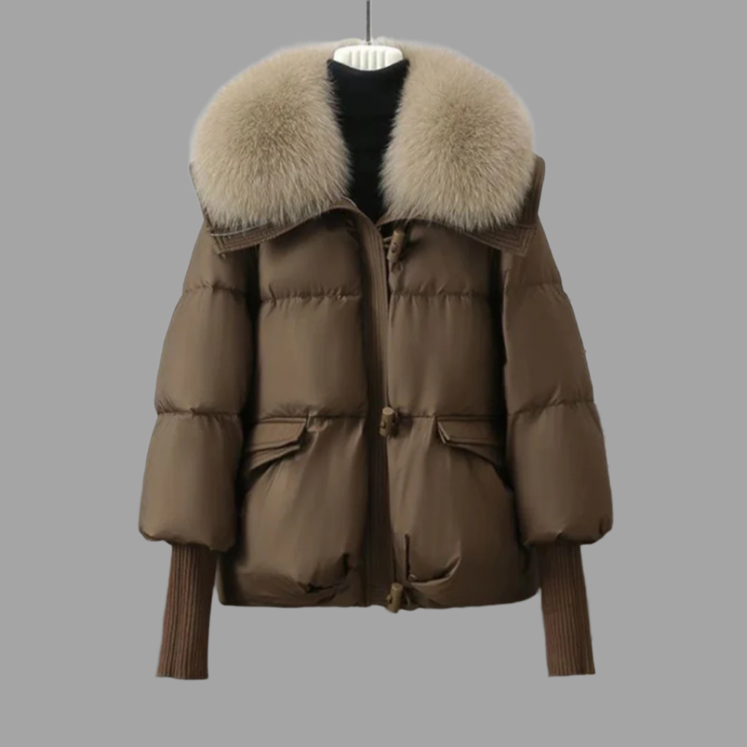 Black oversized puffer down jacket with faux-fur collar, cinched waist, and tapered cuffs