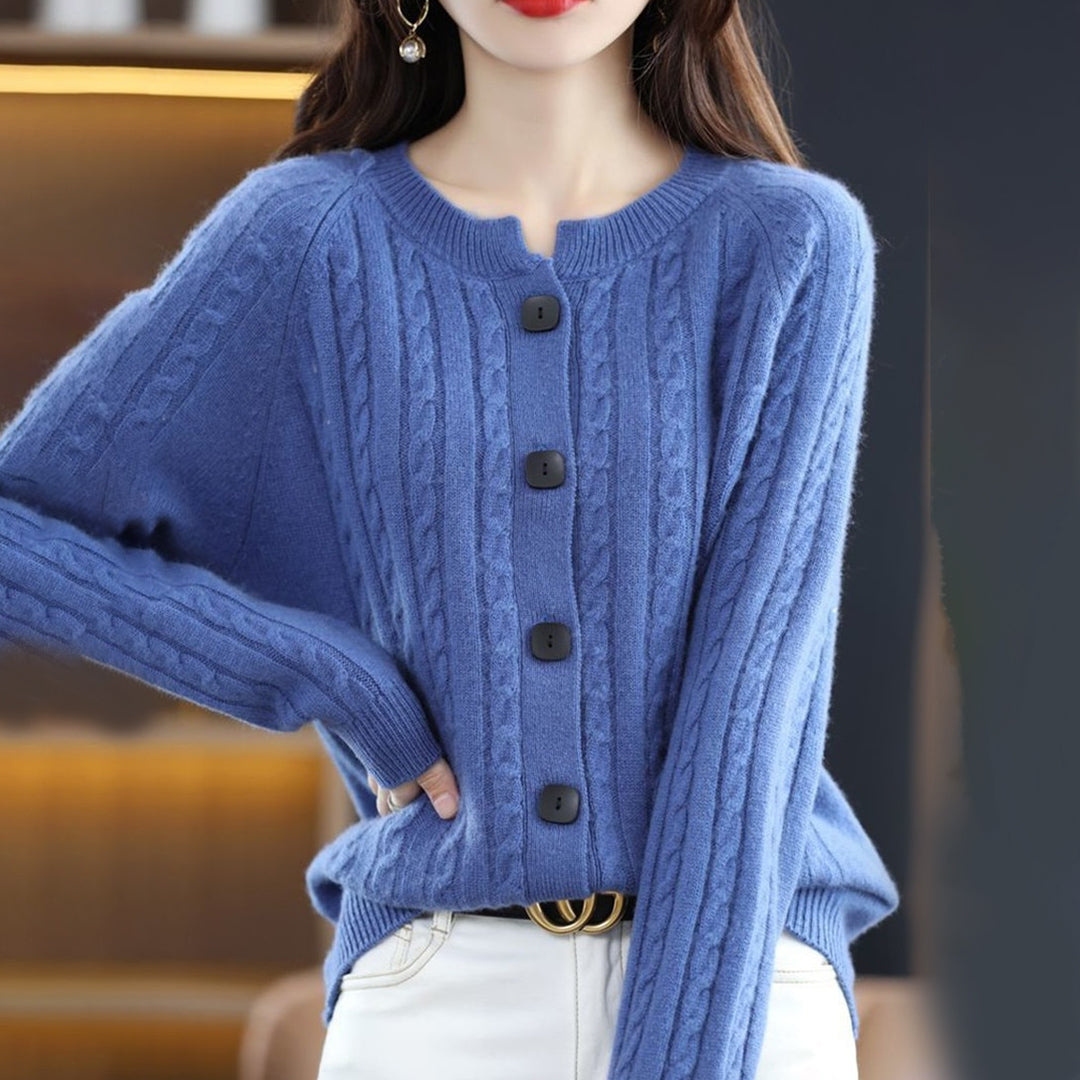 Women's relaxed fit cable knit cardigan with bold buttons, cozy winter style in neutral tone