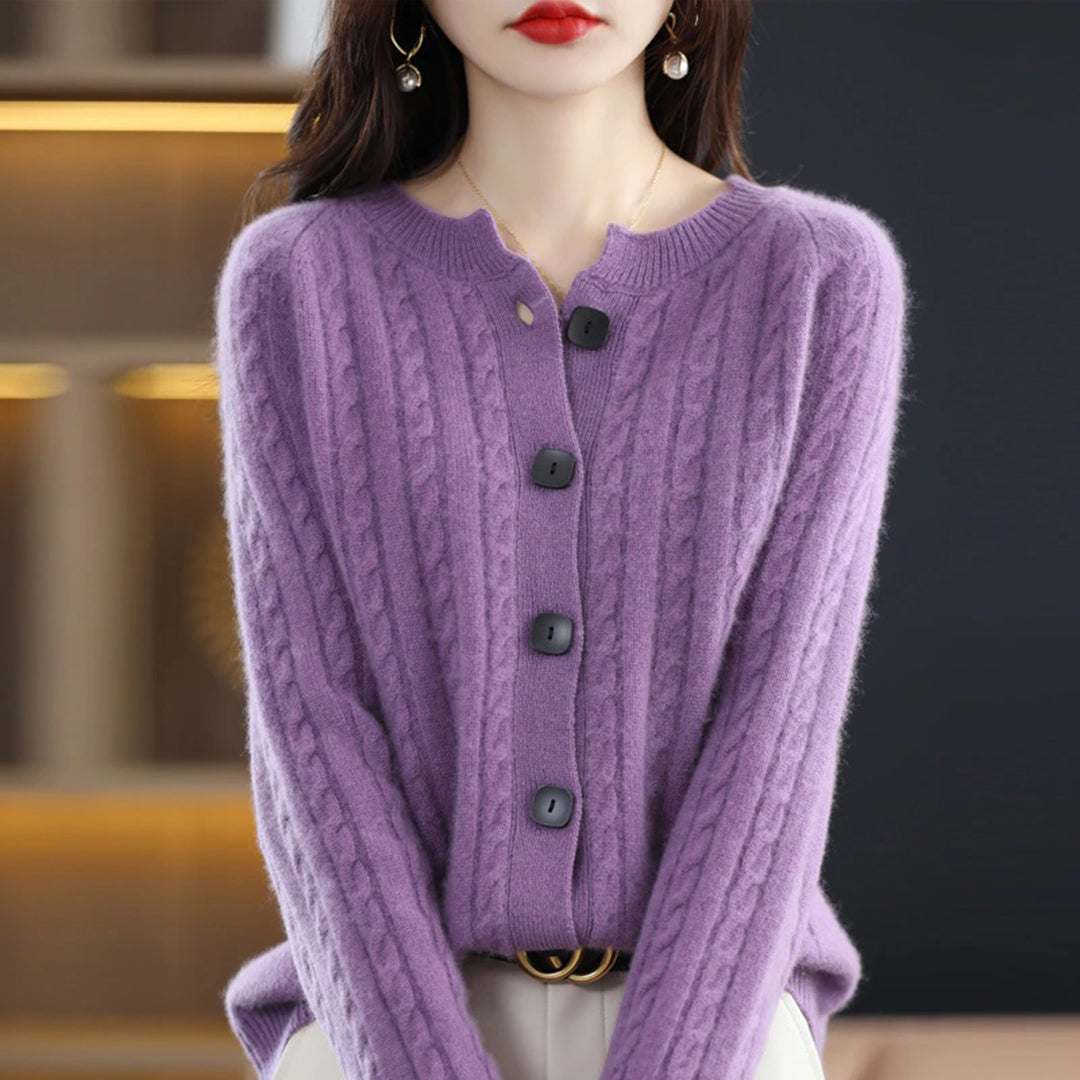 Women's cream cable knit cardigan relaxed fit with bold button-up closure for winter warmth