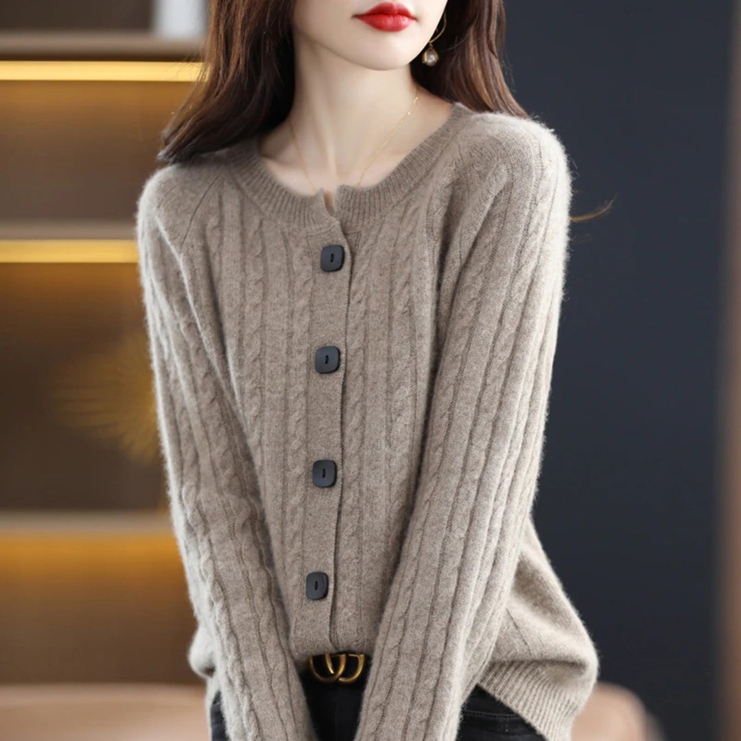 Women's relaxed fit cable knit cardigan with bold buttons, cozy winter style in neutral tones