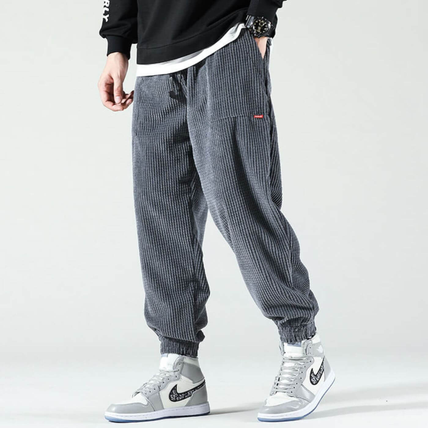 Classic corduroy joggers in warm neutral tones, relaxed tapered fit with elastic waistband