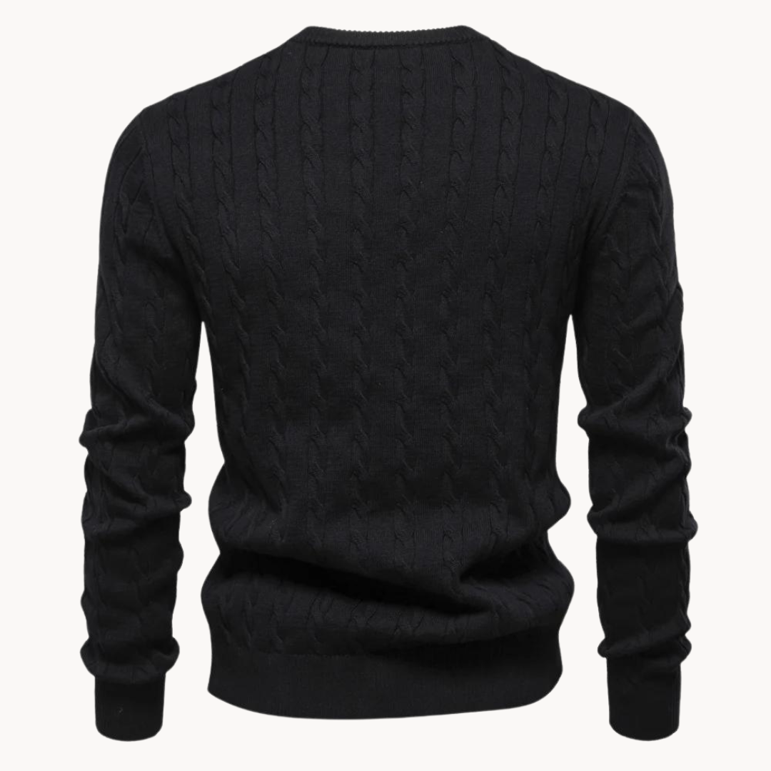 Ivory cable knit crew neck sweater with ribbed trim and classic lightweight layering design