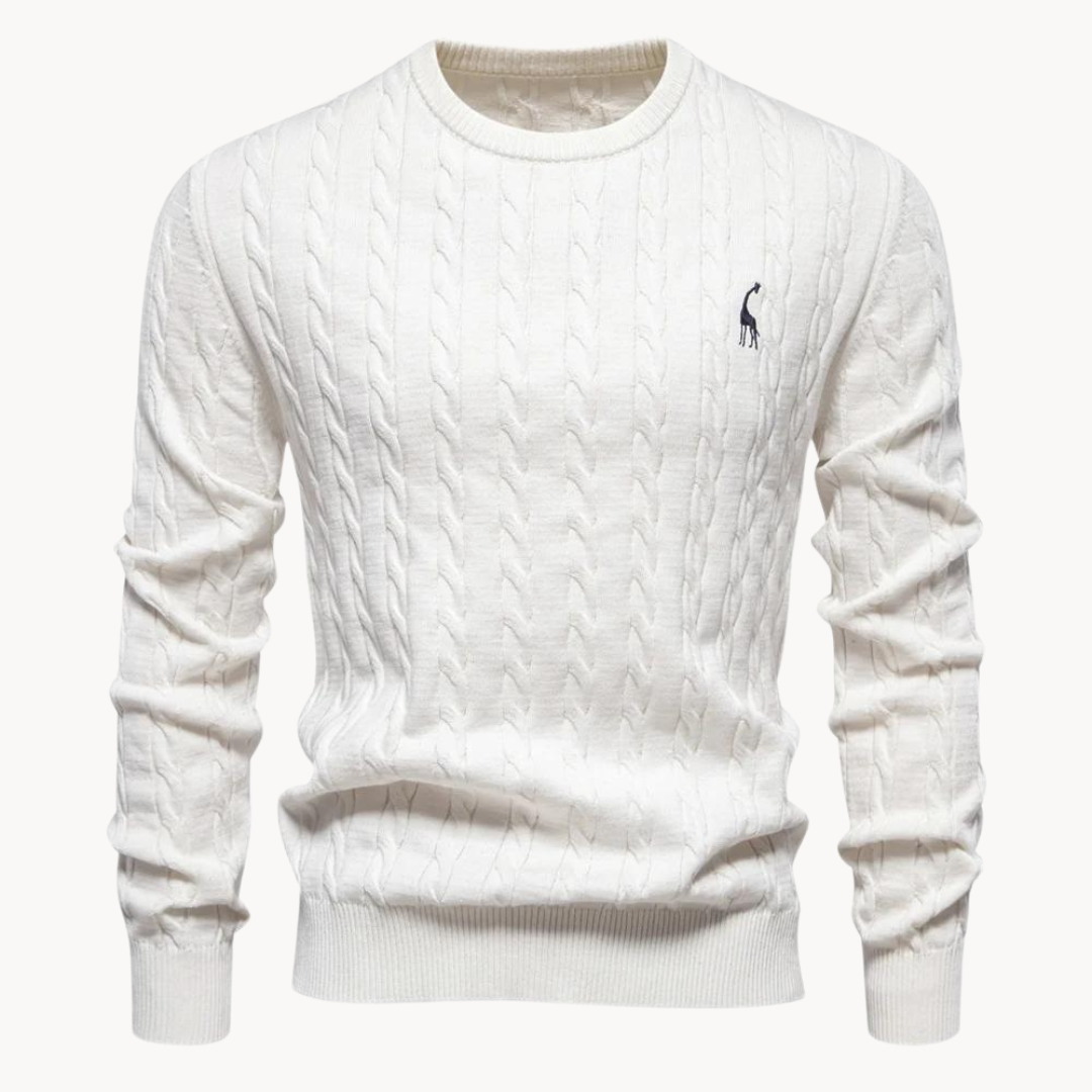 Cream cable knit sweater with crew neckline, ribbed trim, and soft textured pattern for layering