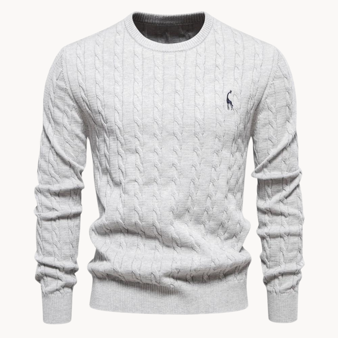 Ivory cable knit crew neck sweater with ribbed trim and lightweight layering design