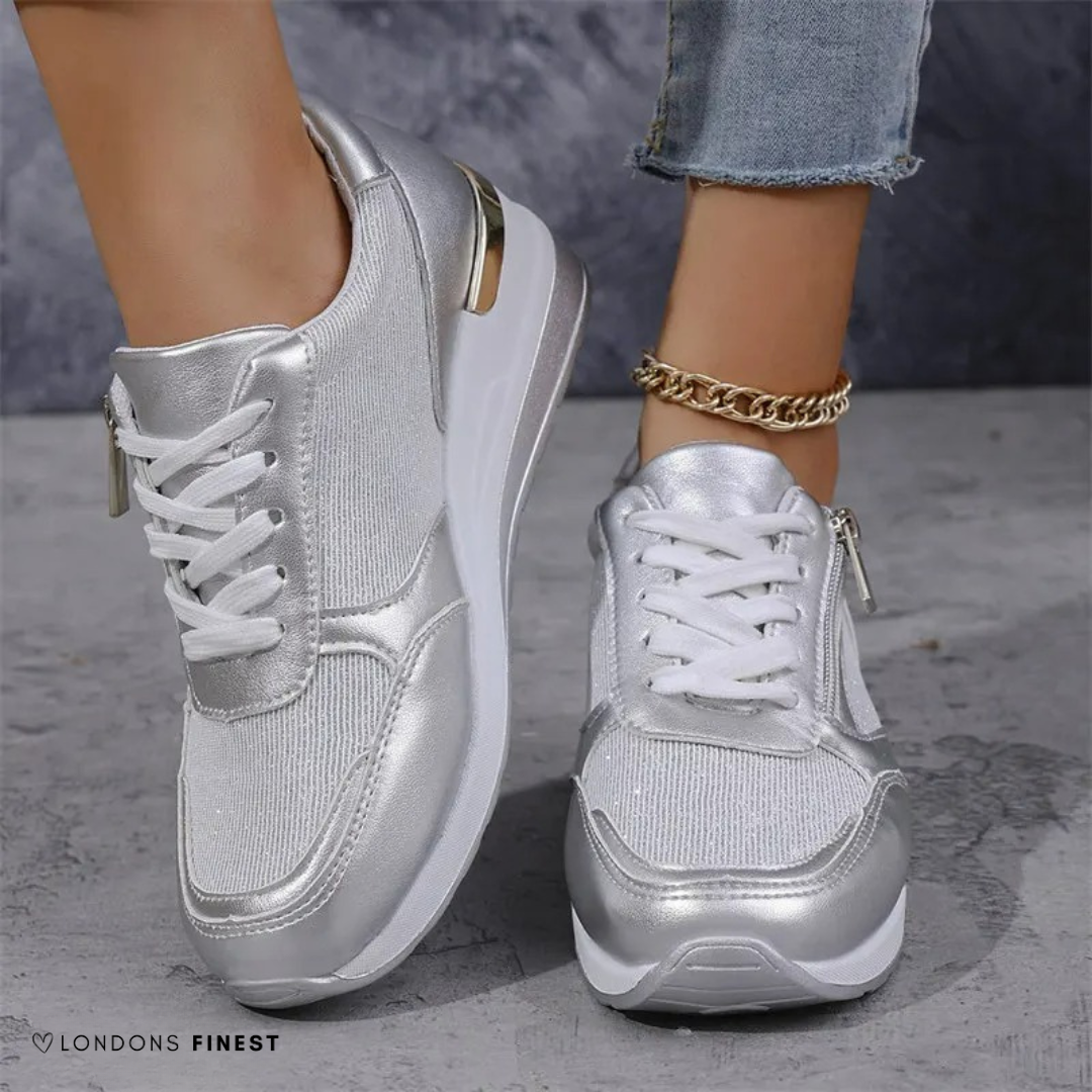 Women's orthopedic arch support shoes in neutral tones with cushioned sole and ergonomic fit