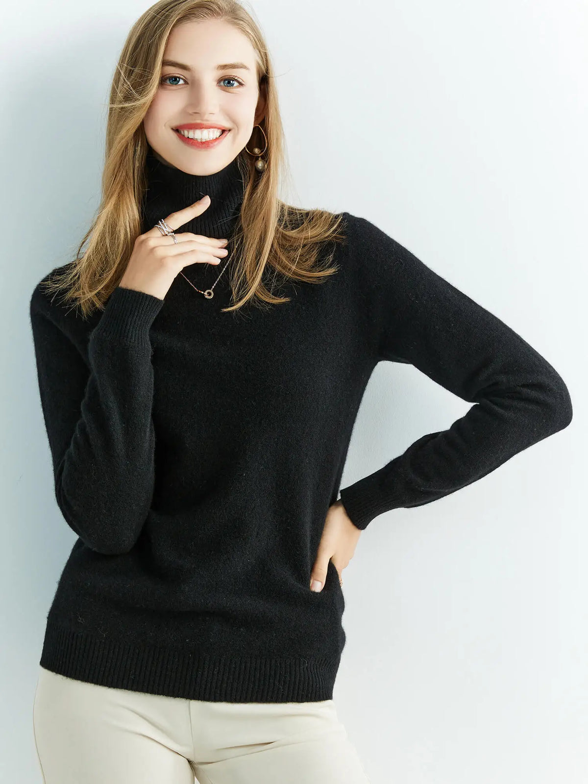Ivory relaxed turtleneck merino wool sweater with ribbed trims and breathable lightweight knit