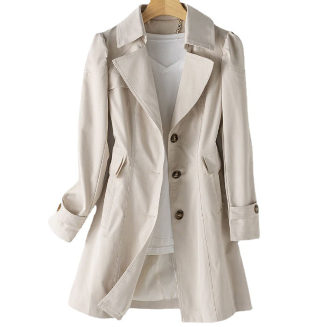 Women's beige double-breasted trench coat classic tailored silhouette structured button closure