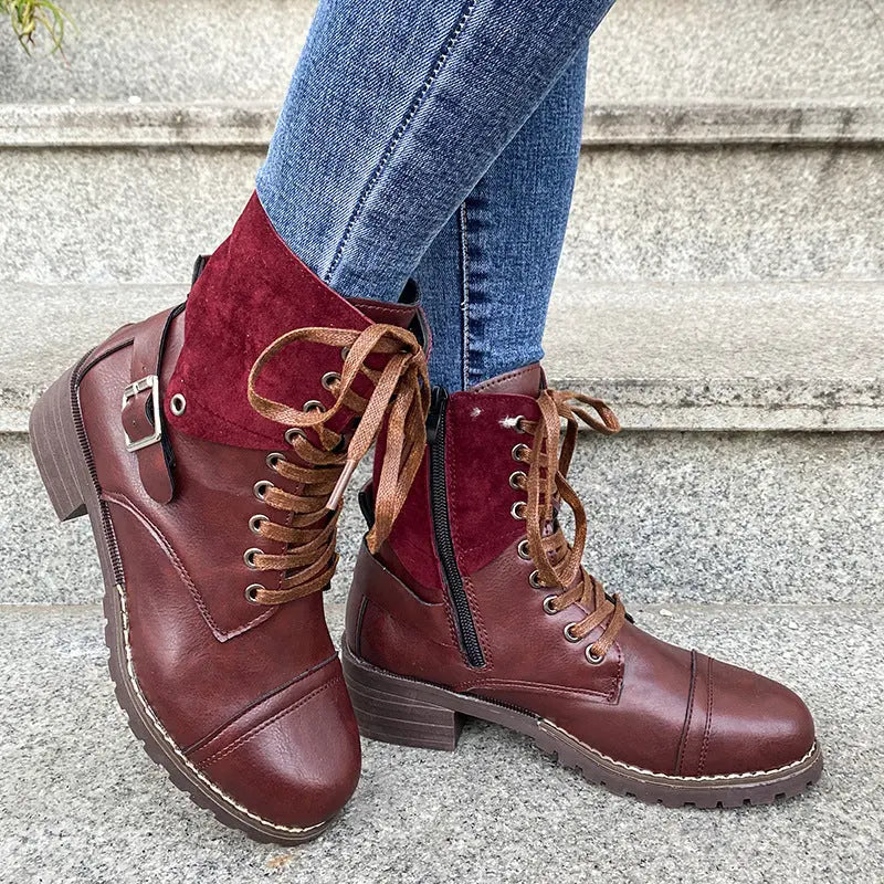 Women's black lace-up combat fashion boots with chunky heel and round toe, stylish winter footwear