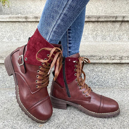 Women's black lace-up combat fashion boots with chunky heel and round toe, stylish winter footwear