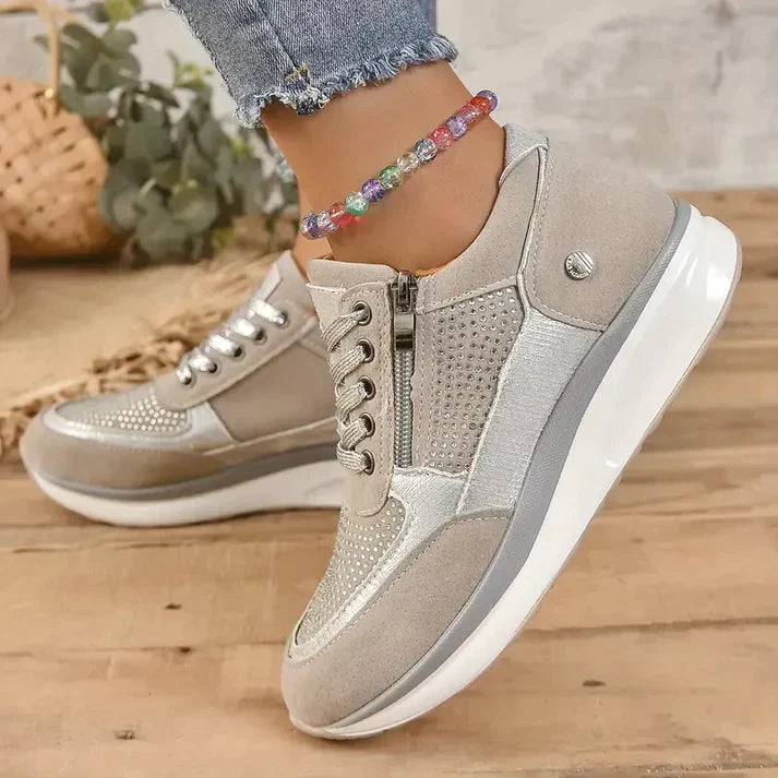 Women's white lace-up sneakers with side zipper closure, sporty silhouette for everyday comfort