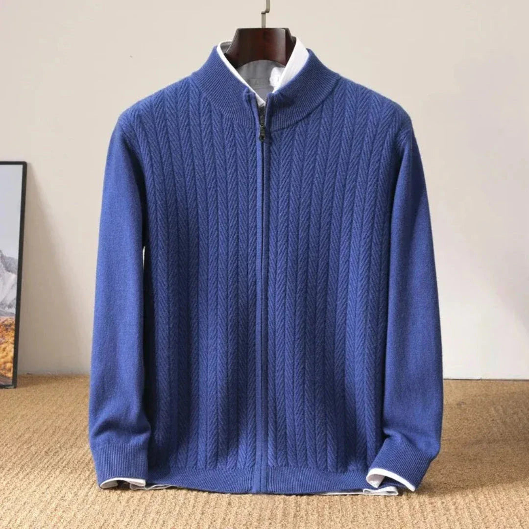 Navy wool zip-up cardigan with herringbone knit texture, stand collar, and ribbed cuffs