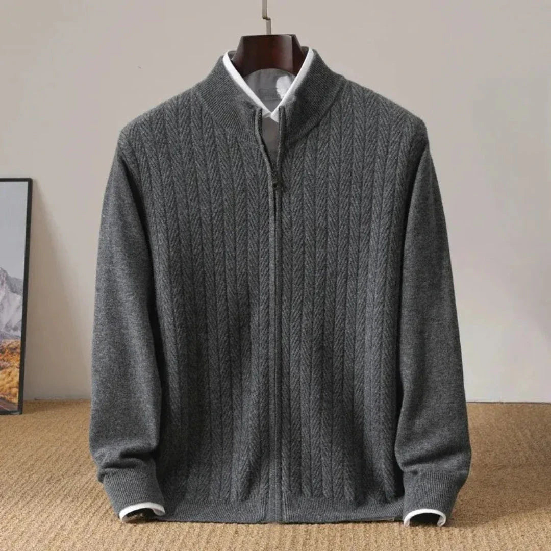 Navy wool zip-up cardigan with herringbone knit texture, stand collar, and ribbed cuffs